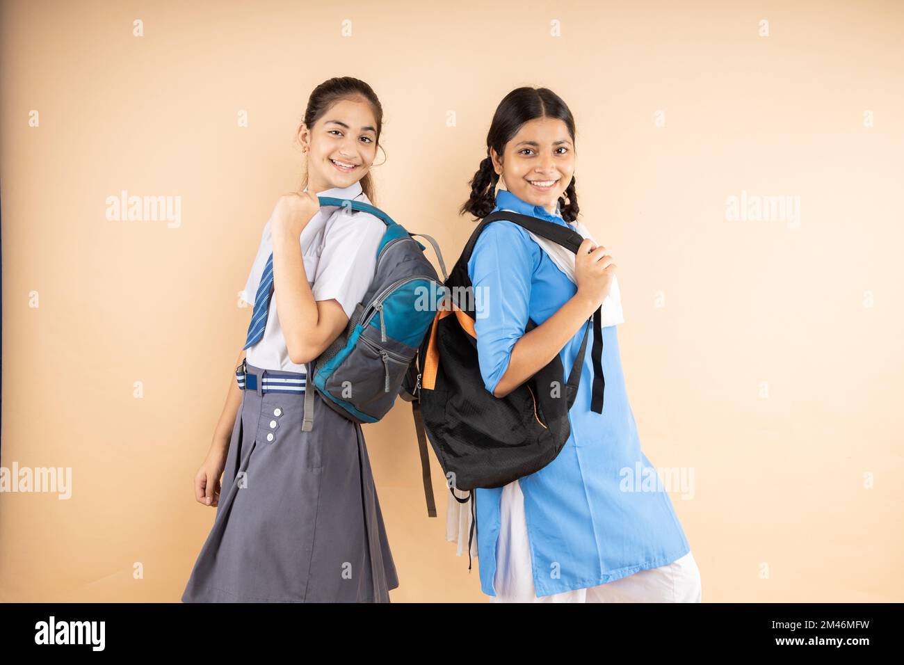 Happy Rural and Modern Indian student schoolgirls wearing school ...