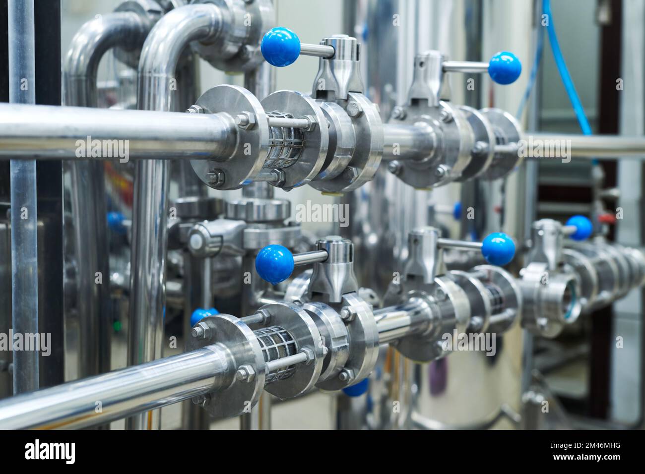 Steel pipeline system at brewery, beer production concept Stock Photo