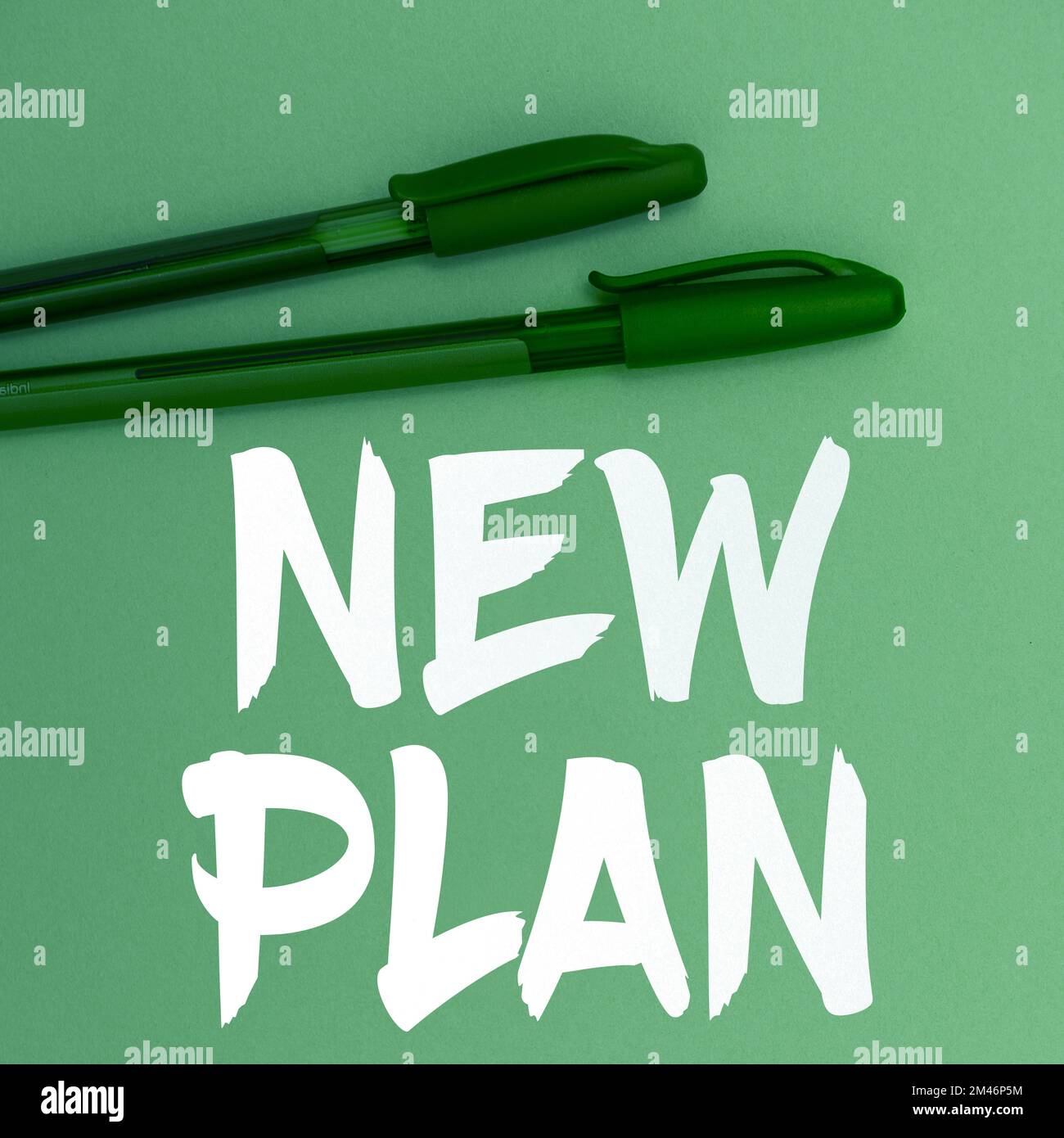 Sign displaying New Plan. Business overview Start of a detailed ...