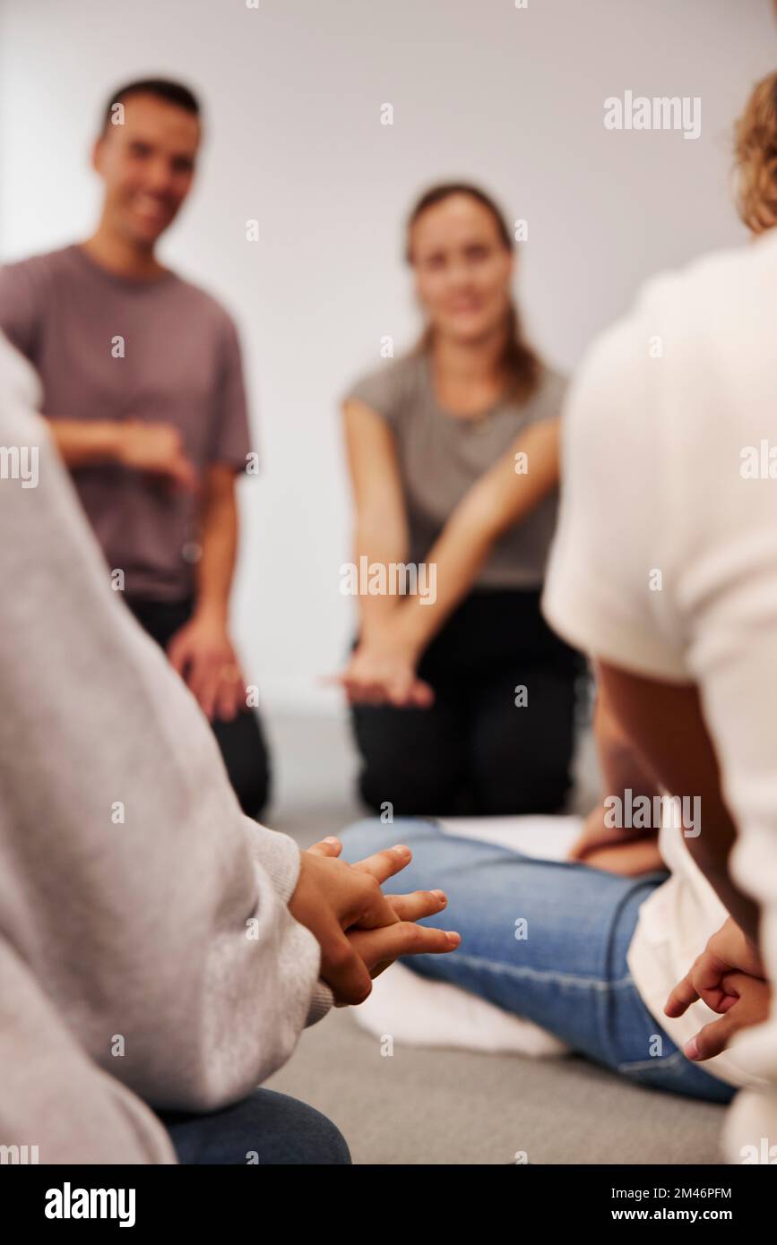 Teachers and children in first aid class Stock Photo Alamy