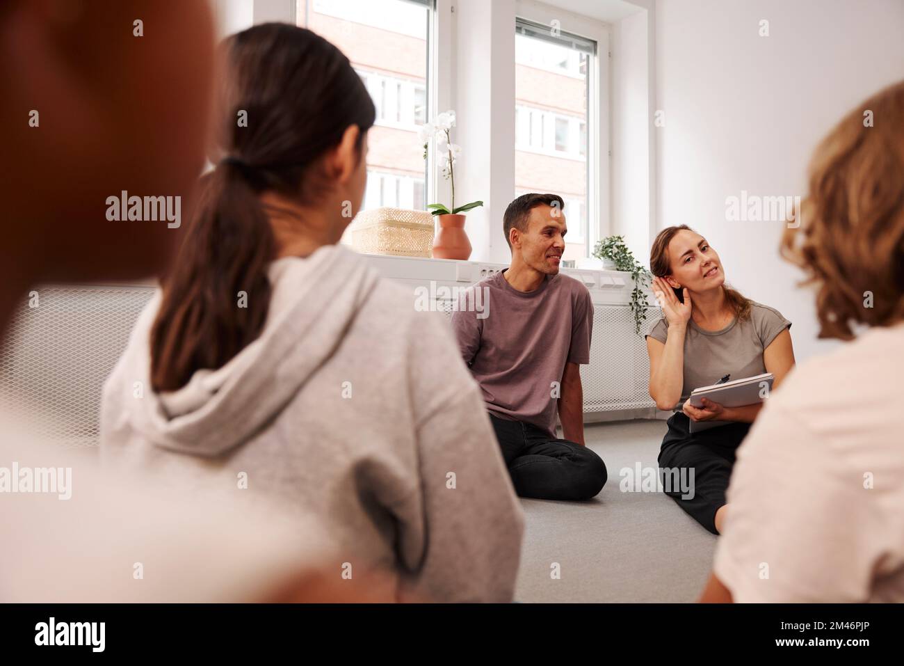 Teachers and children in class Stock Photo