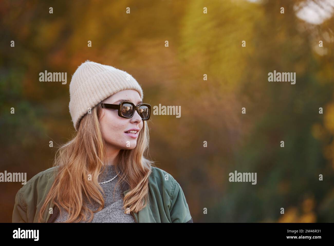 Woman wearing sunglasses looking away Stock Photo
