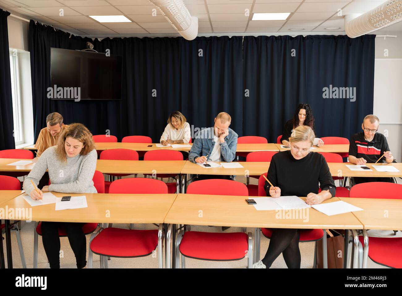 Students in lecture hall Stock Photo
