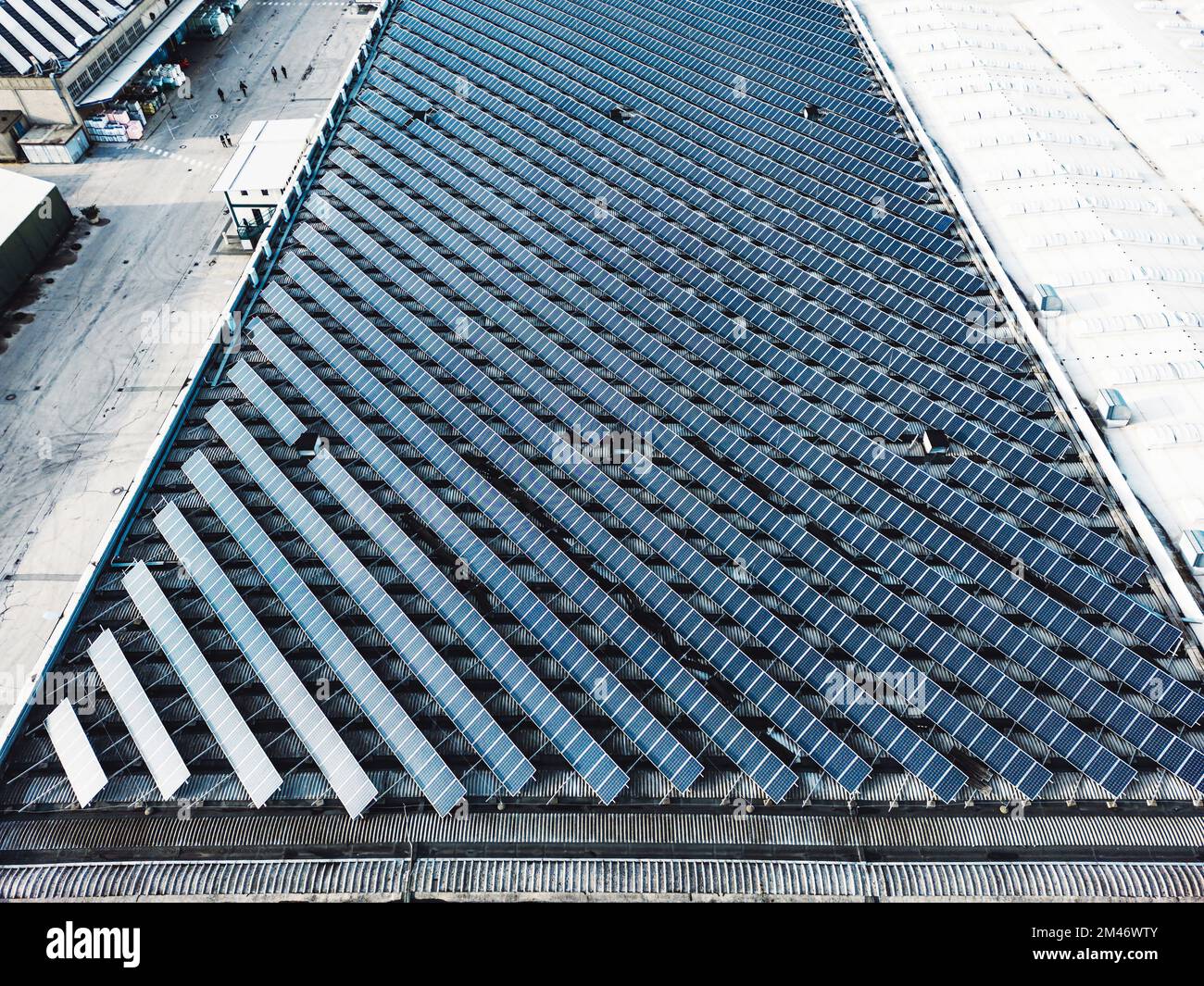 Aerial view of a field of solar panels stacked in lines  Stock Photo