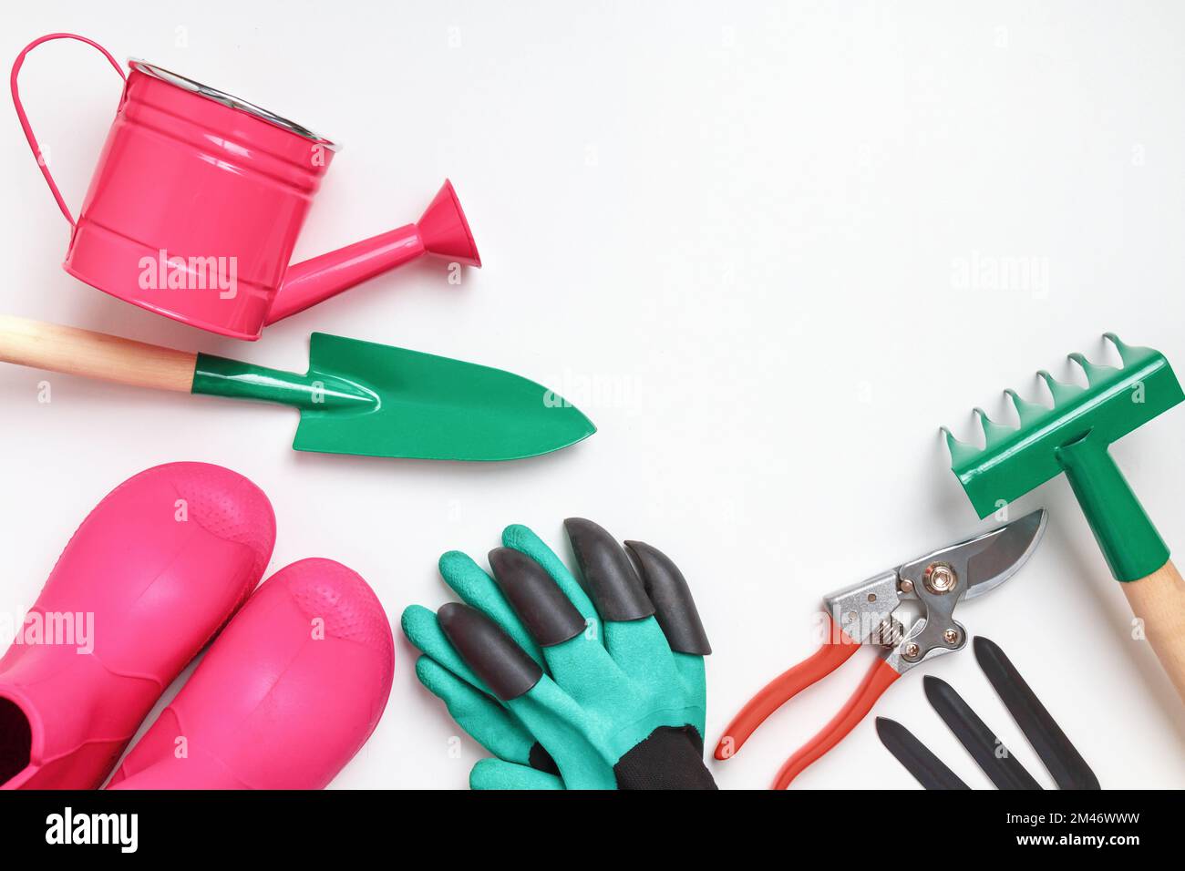 Spring Planting Tools Garden tools on a white table. The concept of spring planting and ...