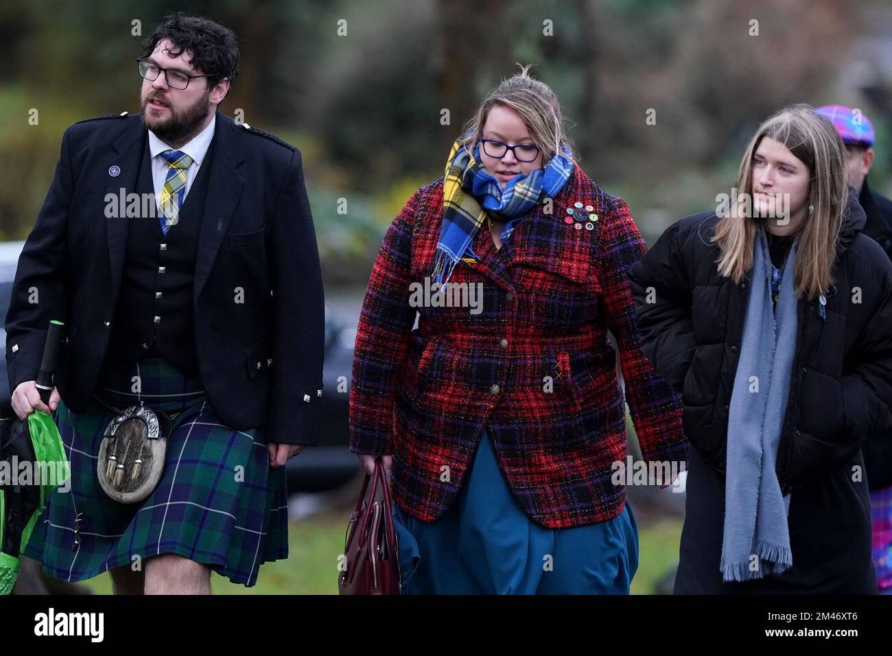 Guests wearing tartan at Melrose Parish Church before a memorial service for Doddie Weir in Melrose, Scotland. Doddie Weir died aged 52 on the 26th November after suffering from motor neurone disease. Issue date: Monday December 19, 2022. Stock Photo