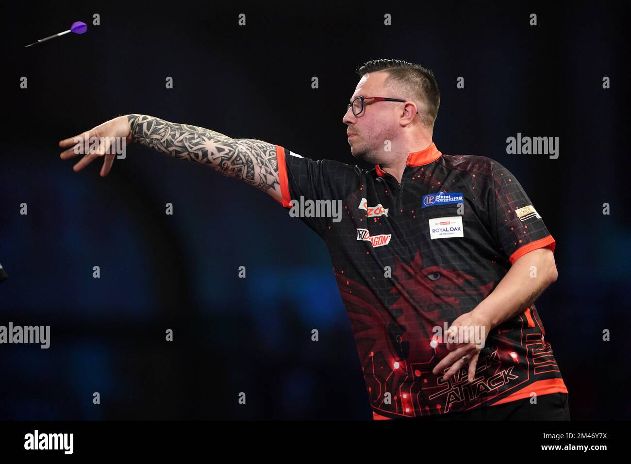 Wales' Robert Owen in action against England's Andrew Gilding during
