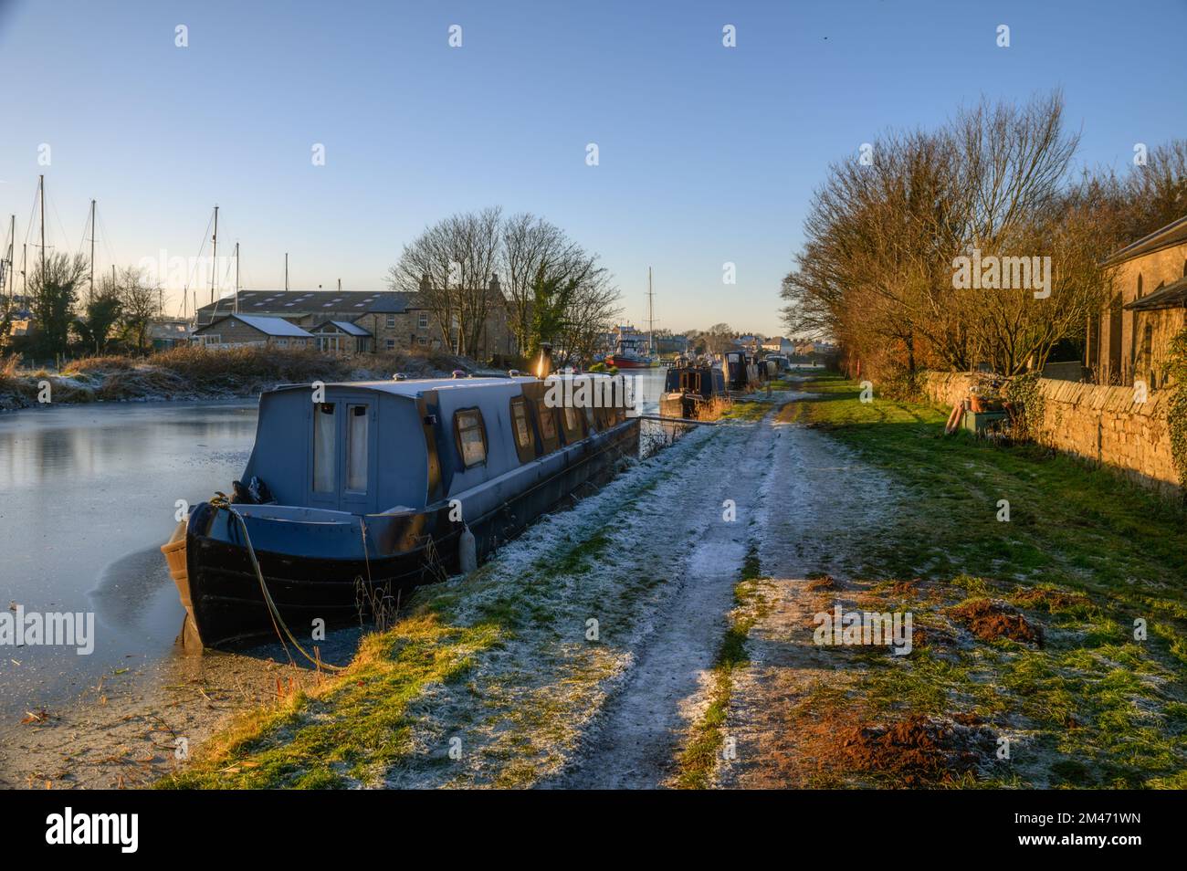 Narrow boats on the Glasson Branch of the Lancaster Canal near Glasson Dock Stock Photo