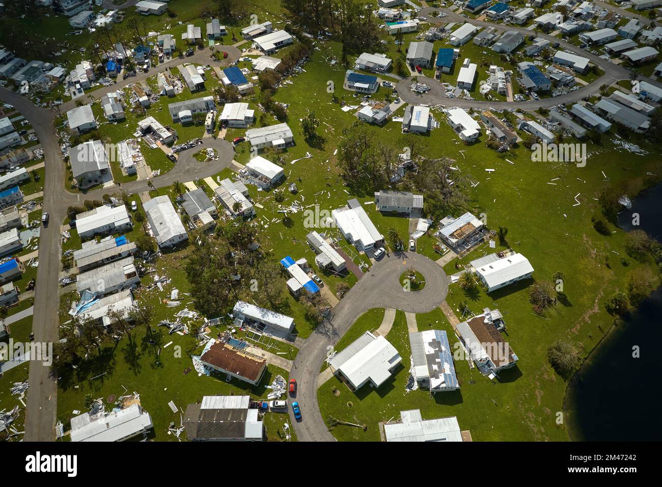 Badly damaged mobile homes after hurricane Ian in Florida residential