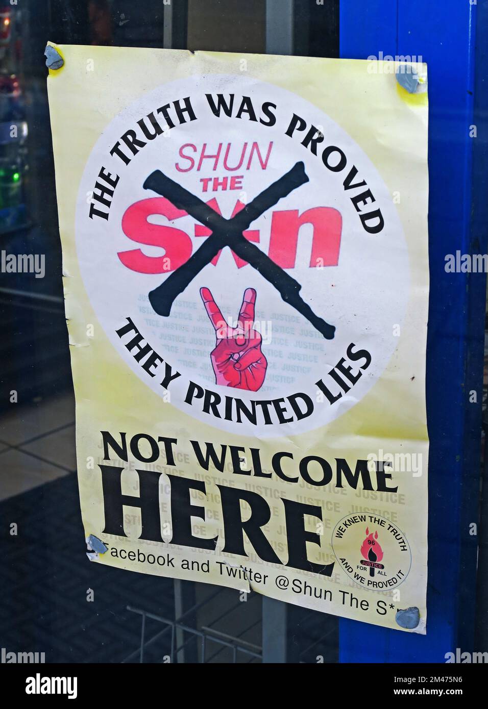 The Truth was proved,Shun the Sun, they printed lies,Not welcome Here poster, newsagent, Liverpool city centre, Merseyside, England, UK, L1 Stock Photo