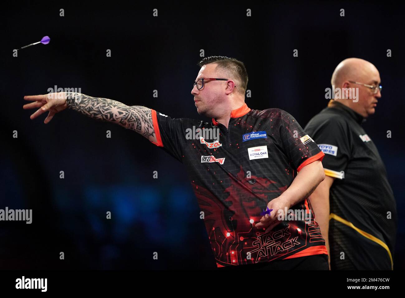 Wales' Robert Owen in action against England's Andrew Gilding during