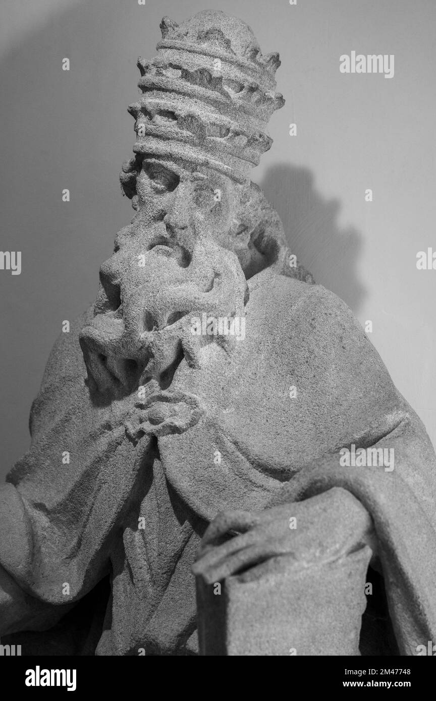 Statue of a pope (Saint Gregory the Great?) on the premises of the Bratislava City Museum. Stock Photo