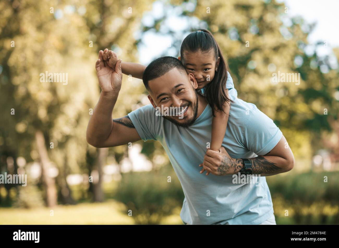 Spening Time Dad and daughter spening time together in the park Stock Photo - Alamy