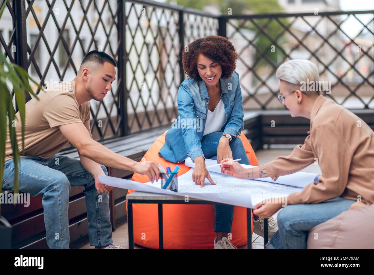 Architectural team working on a site development plan Stock Photo