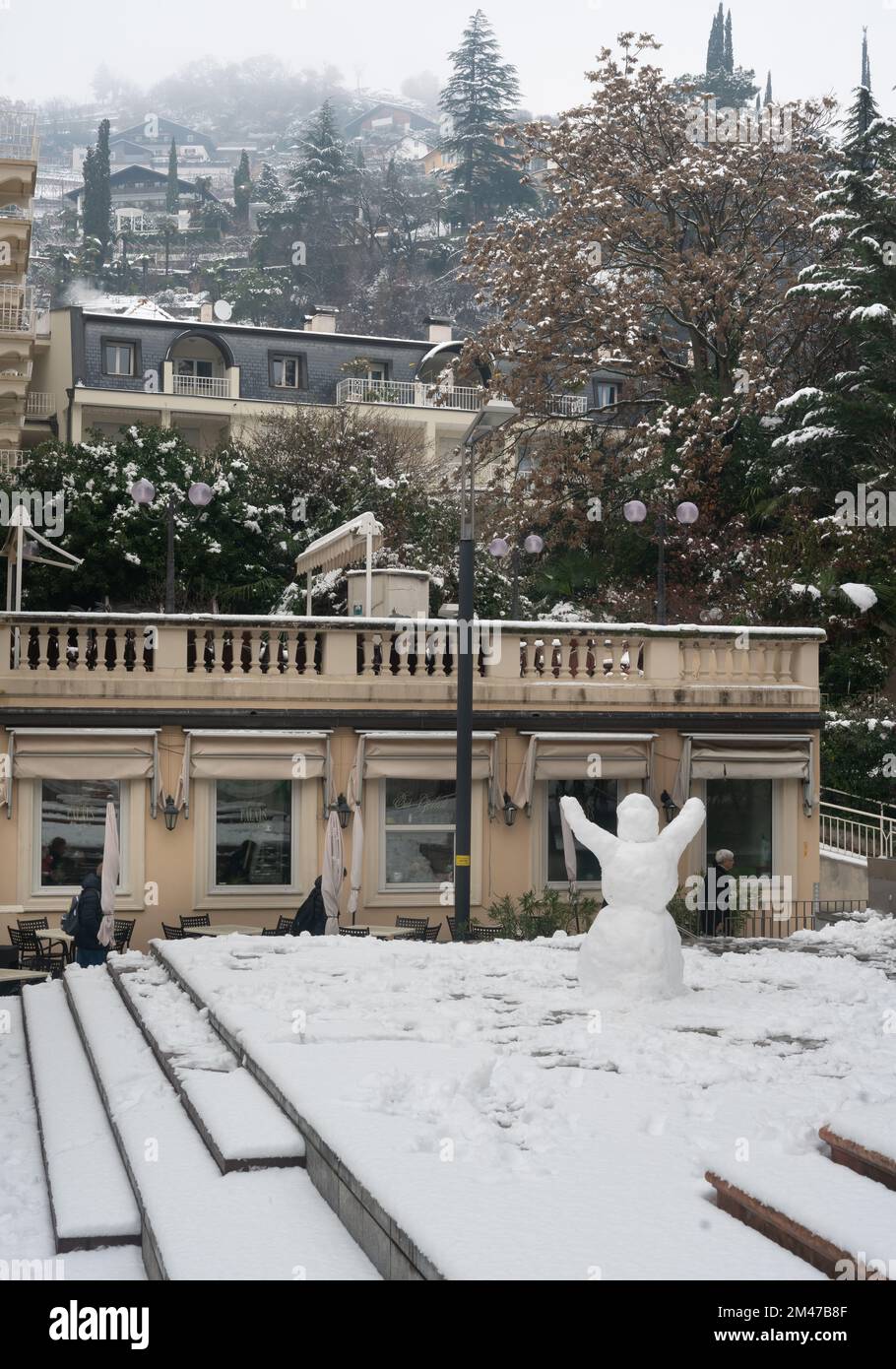 MERANO, ITALY Piazza della Rena (Sandplatz) with a snow puppet during