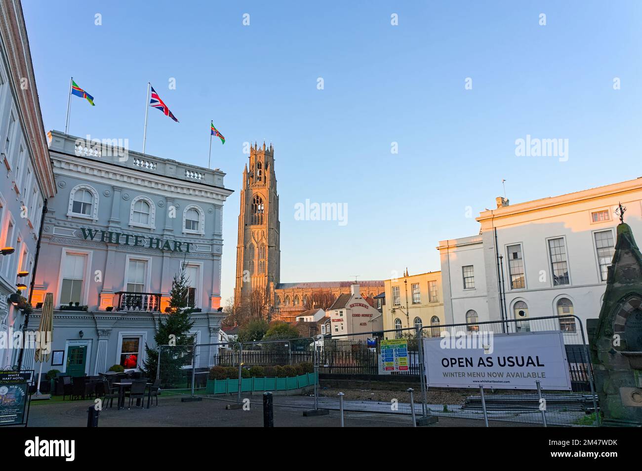 The White Hart hotel and the old assembly rooms with Boston stump in the background at sundown Stock Photo
