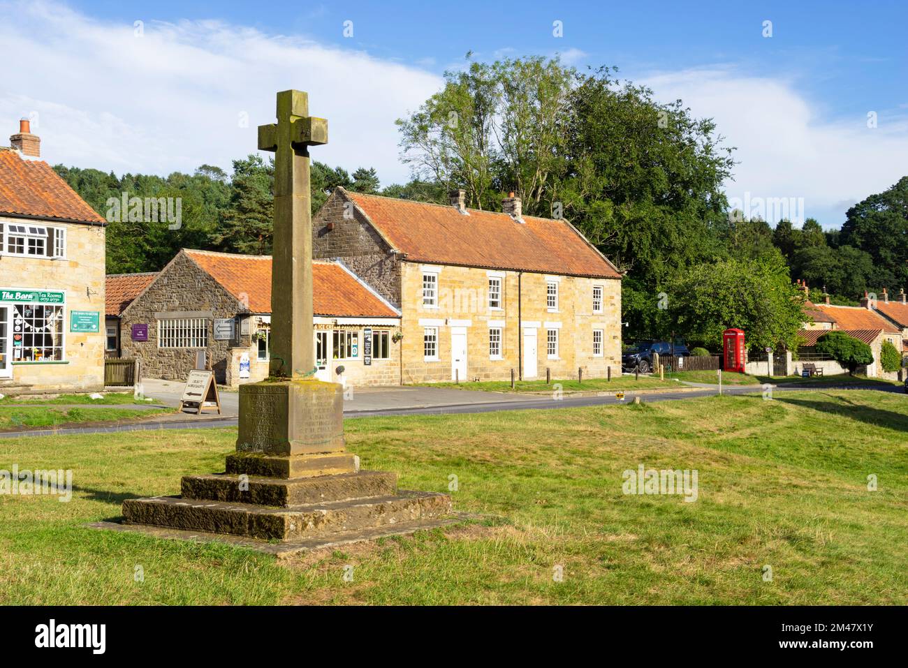Hutton le Hole North Yorkshire Memorial cross on the village green Hutton le Hole Yorkshire England UK GB Europe Stock Photo