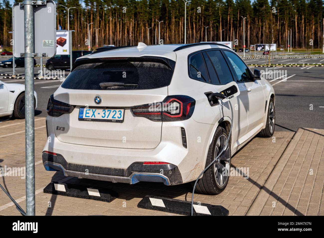 Riga, Latvia, April 29, 2022 electric cars Tesla Model S and BMW ix3