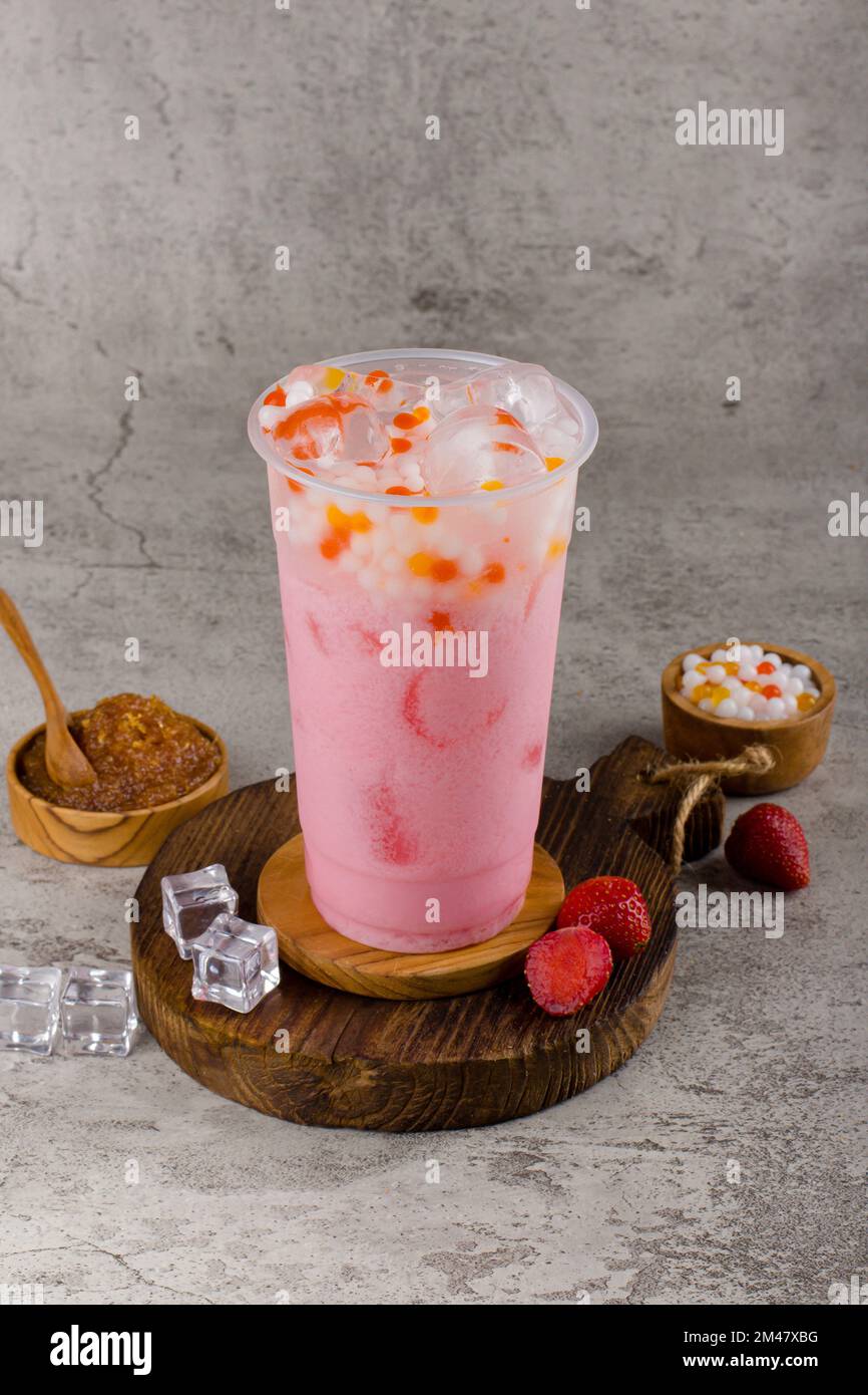 Boba or tapioca pearls is taiwan bubble milk tea in plastic cup with ...