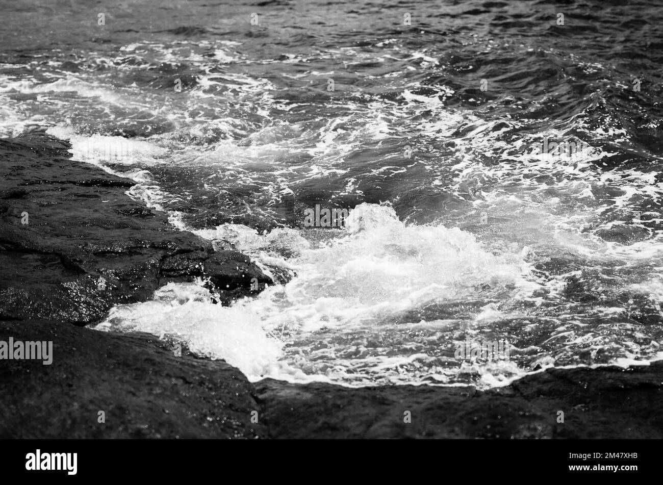 Beach sand waves on the beach waves crashing blue sky Black and White ...