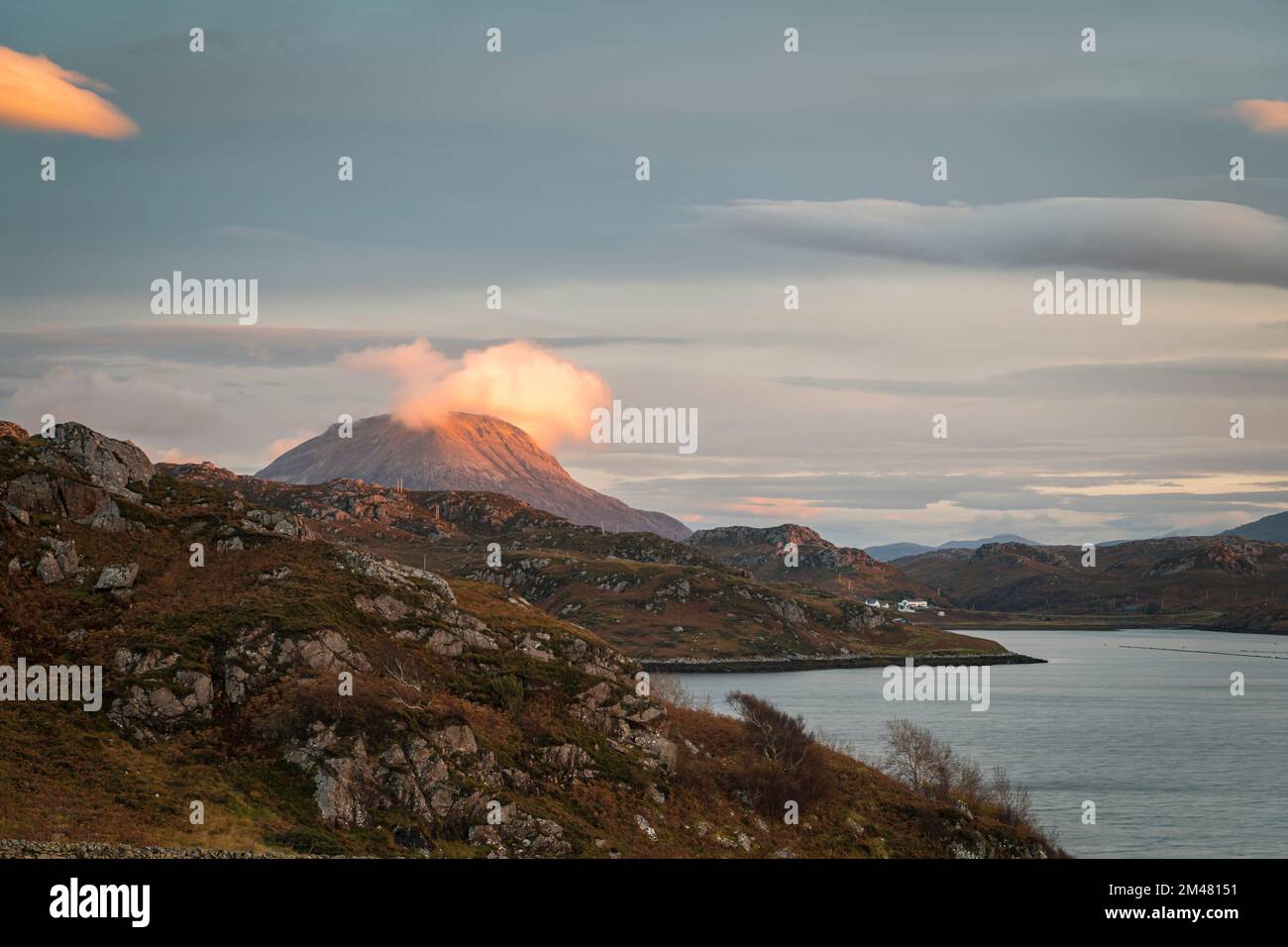 An autumnal landscape HDR image of Arkle and Loch Inchard at dusk, near Kinlochbervie, Sutherland, Scotland. 29 October 2022 Stock Photo