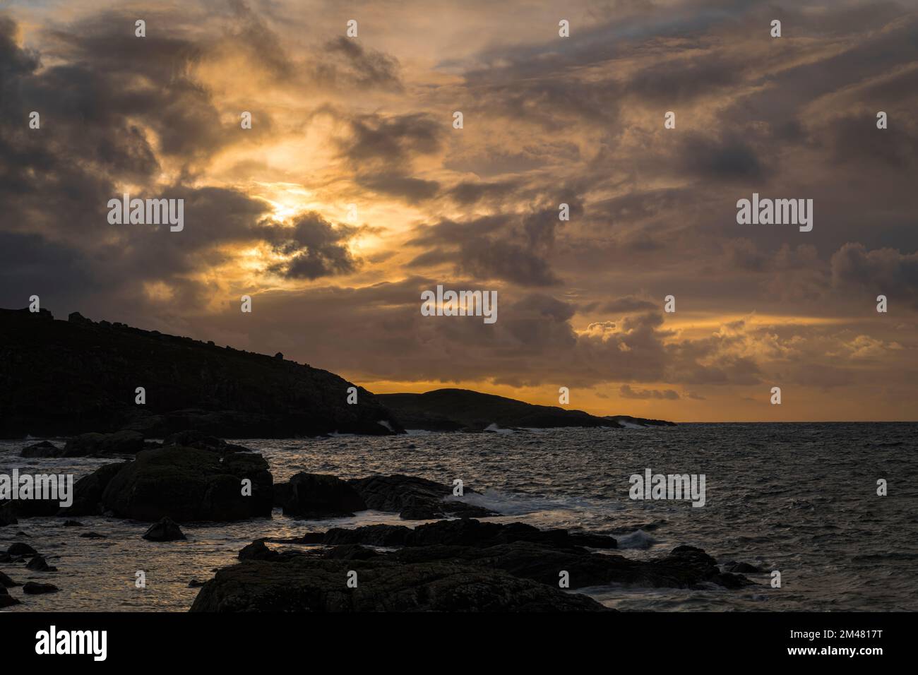 An autumnal HDR coastal sunset image at Port Chaligaig near Kinlochbervie, Sutherland, Scotland. 03 Noverber 2022 Stock Photo