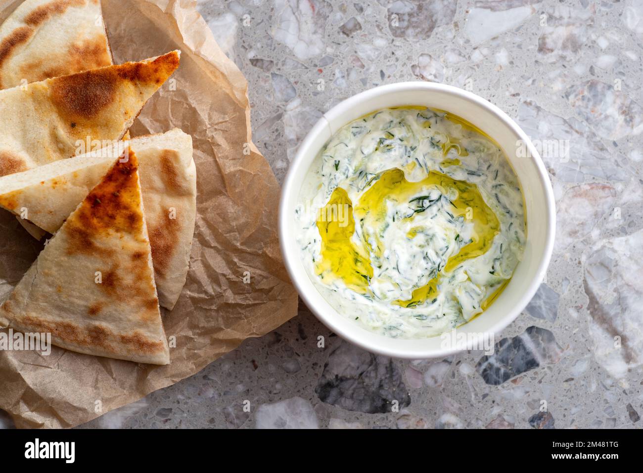 Traditional Greek Tzatziki dip sauce made with cucumber sour cream