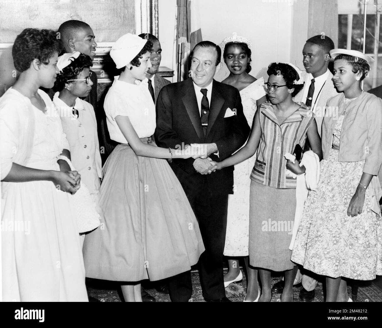 New York City Mayor Robert Wagner greeting the 'Little Rock Nine', nine teenagers who attended Central High School, Little Rock, Arkansas. The Little Rock Nine were a group of nine African American students enrolled in Little Rock Central High School in 1957. Stock Photo