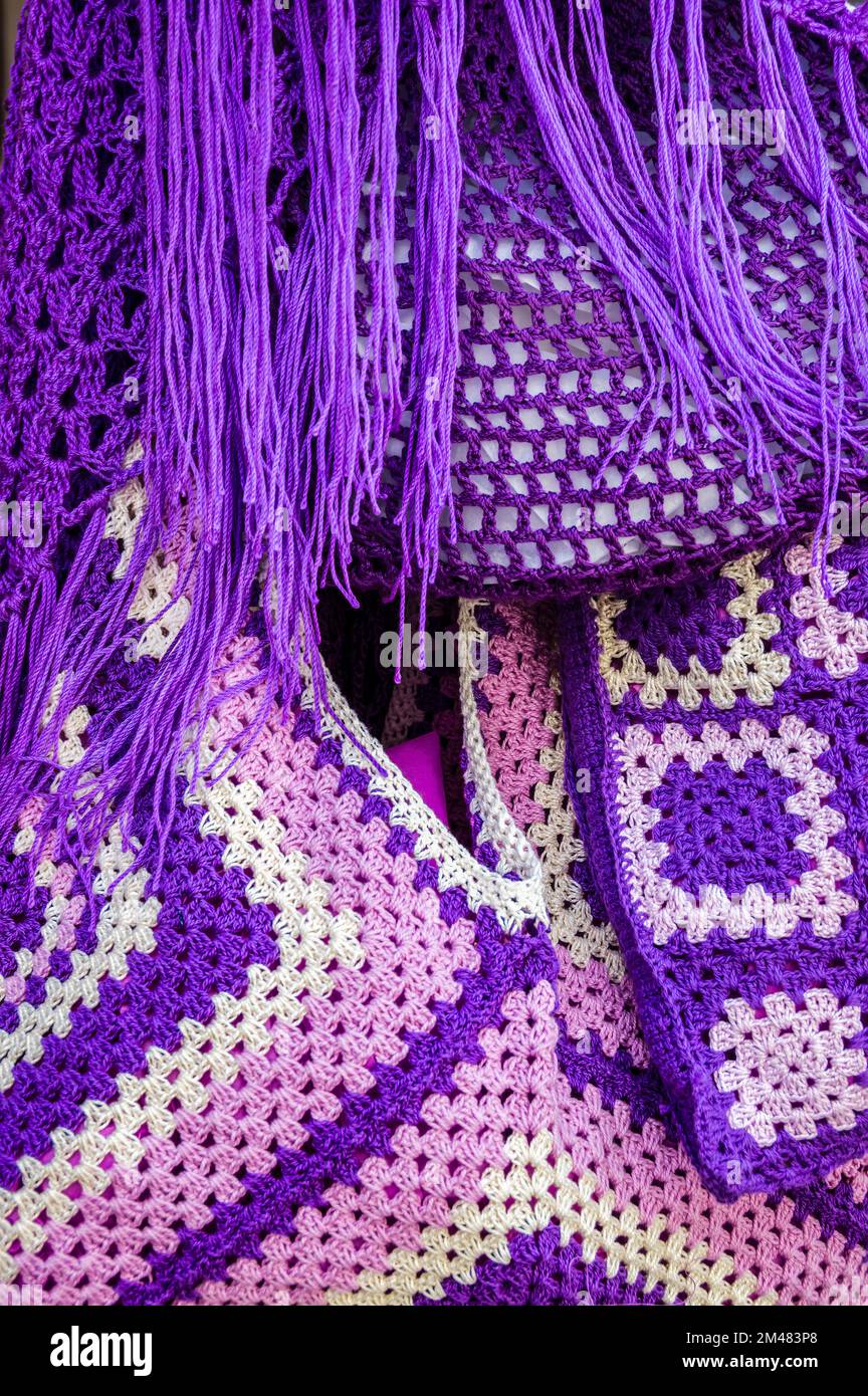 Embroidered violet bags at Brhuega's street market. Lavender festival, Spain Stock Photo