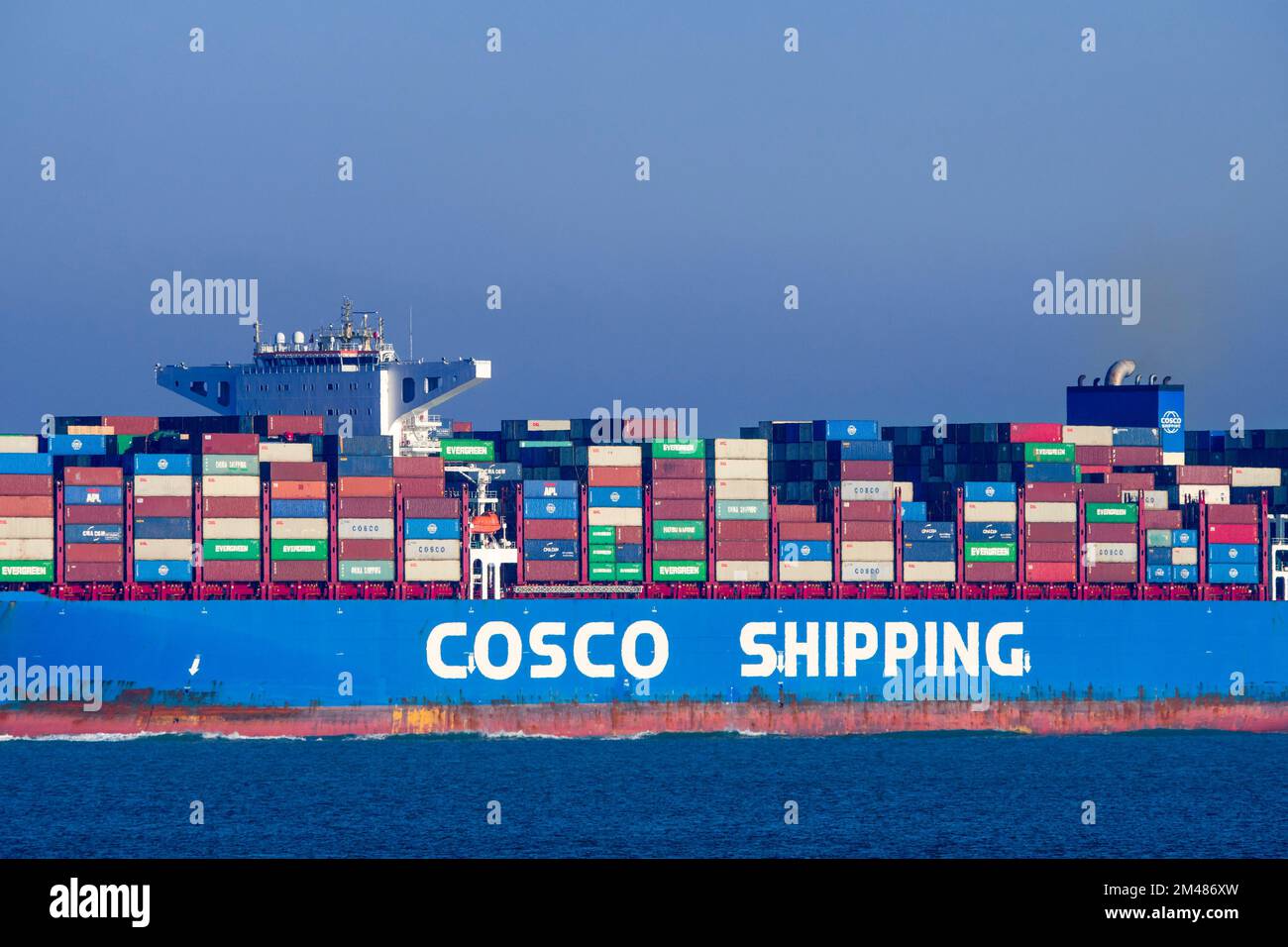 Chinese container ship / containership COSCO Shipping Sagittarius loaded with containers on the North Sea, sailing under flag of Hong Kong, China Stock Photo