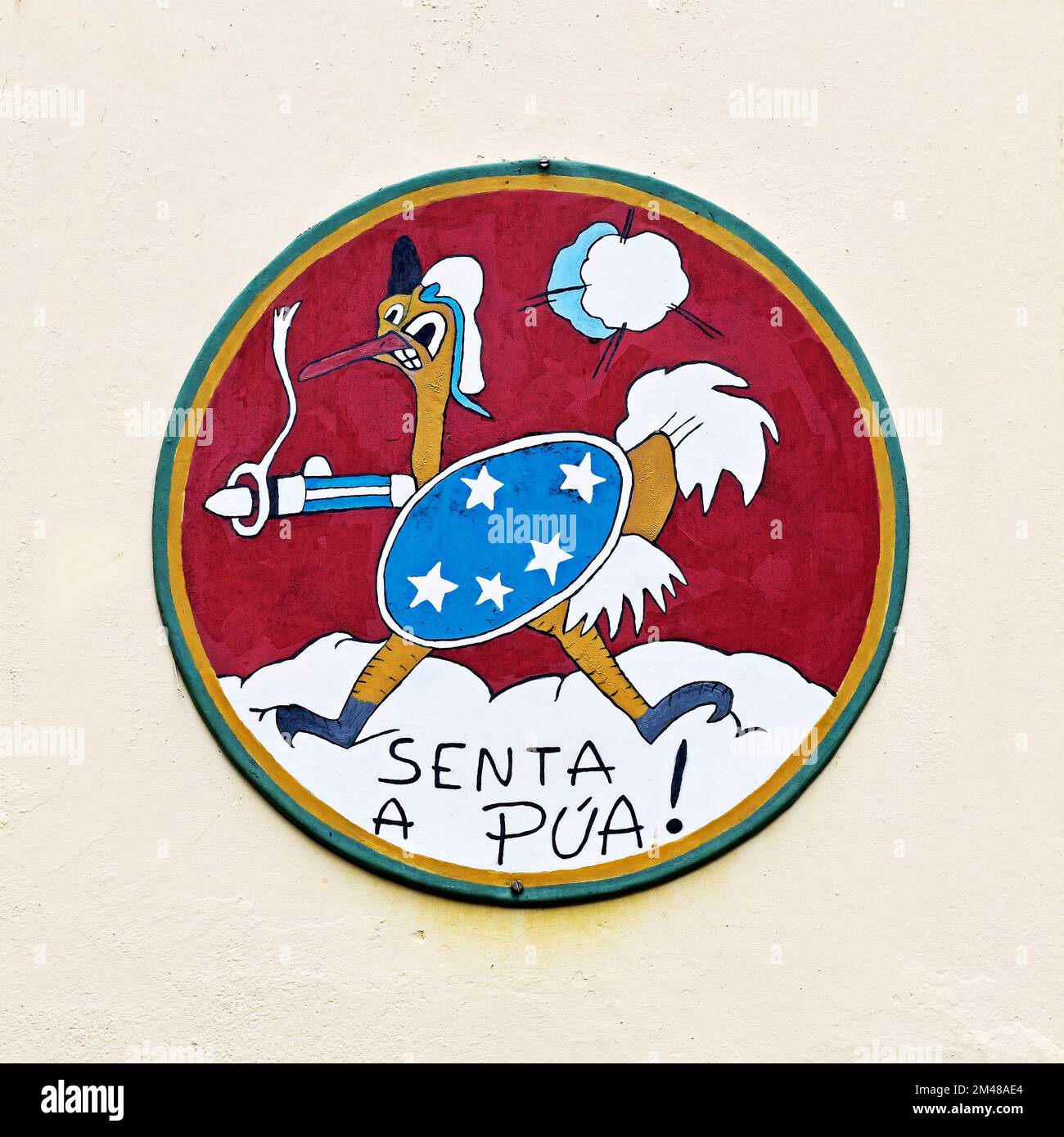 PETROPOLIS, RIO DE JANEIRO, BRAZIL - October 28, 2022: Insignia of the 1st Fighter Aviation Group painted on the wall. 'Senta a Púa' (Send a Bullet) Stock Photo