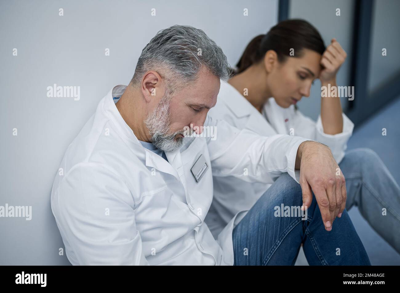 Doctors feeling exhausted after the hard shift Stock Photo Alamy