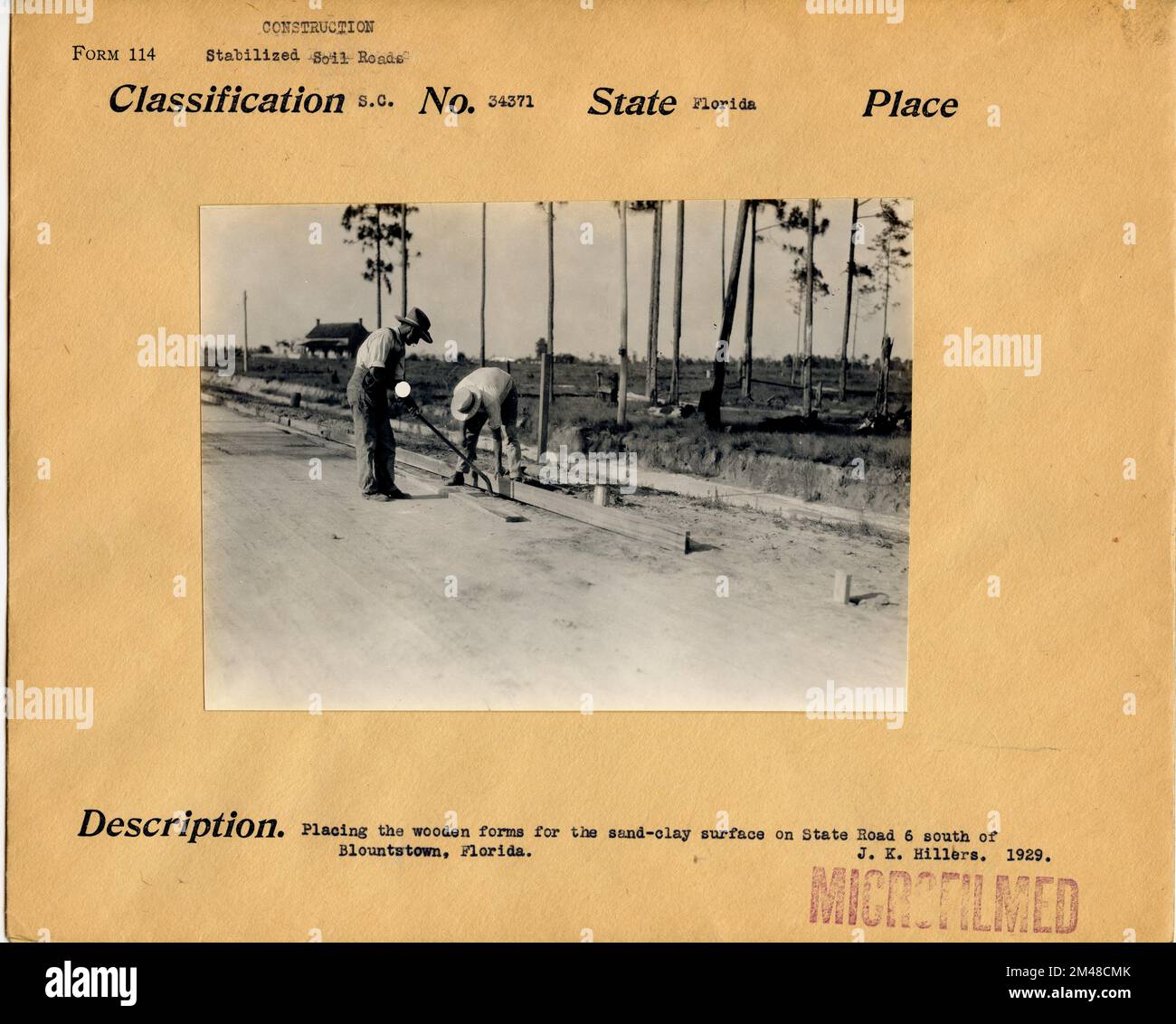 Sand-clay surface on State Road 6, south of Blountstown, Florida. Original caption: Placing the wooden forms for the sand-clay surface on State Road 6 south of Blountstown, Florida. J. K. Hillers. 1929. State: Florida. Place: Blountstown. Stock Photo