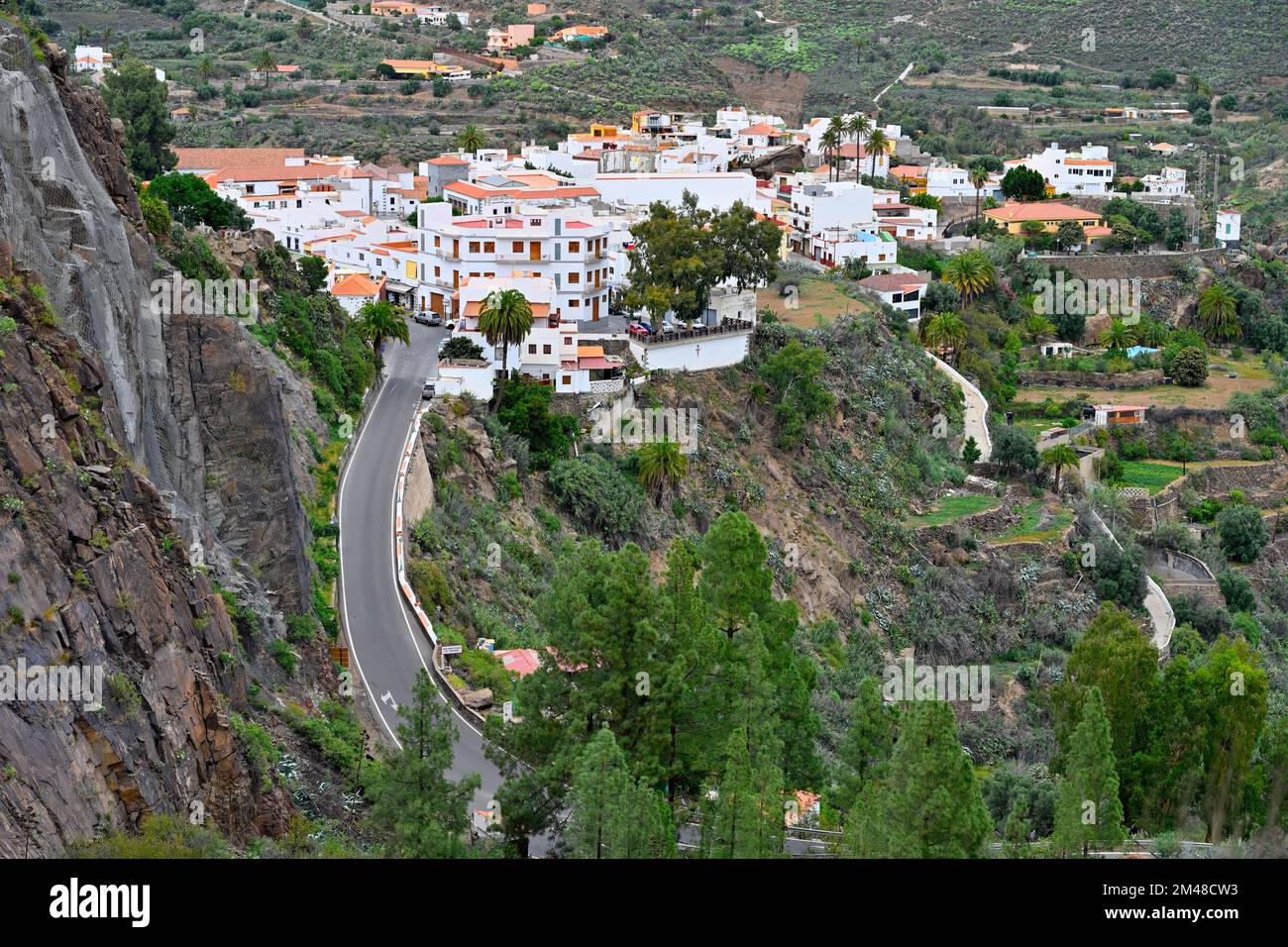 View of picturesque Village of San Bartolomé de Tirajana with white houses in the mountains, Gran Canaria Stock Photo
