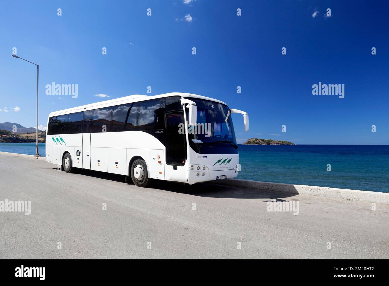 Stylish coach parked by the sea. Lesbos, Taken September / October 2022 Stock Photo