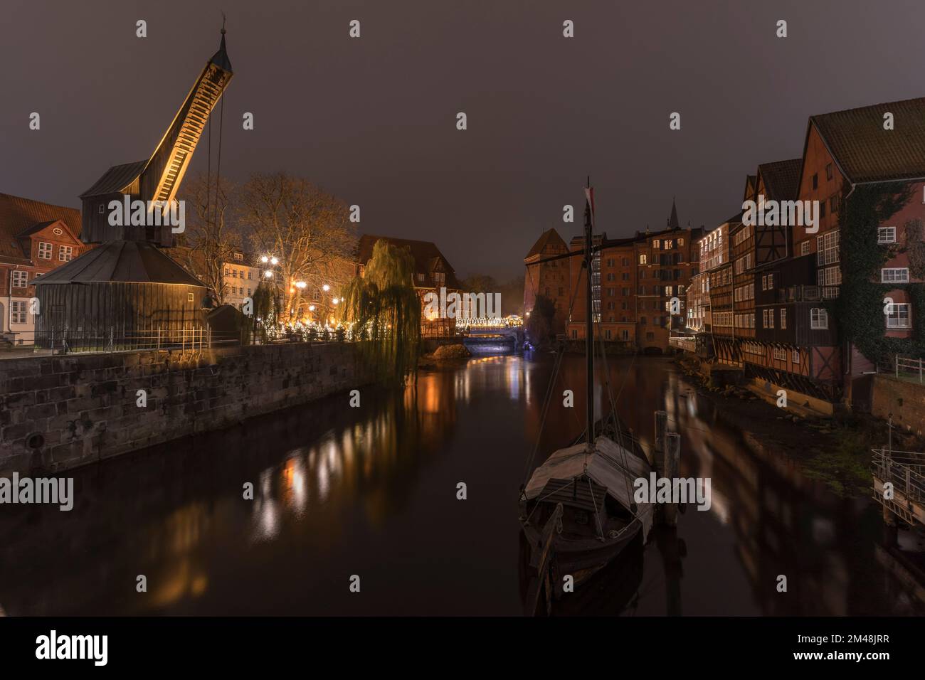 Historic harbor of Lüneburg at night. Stock Photo
