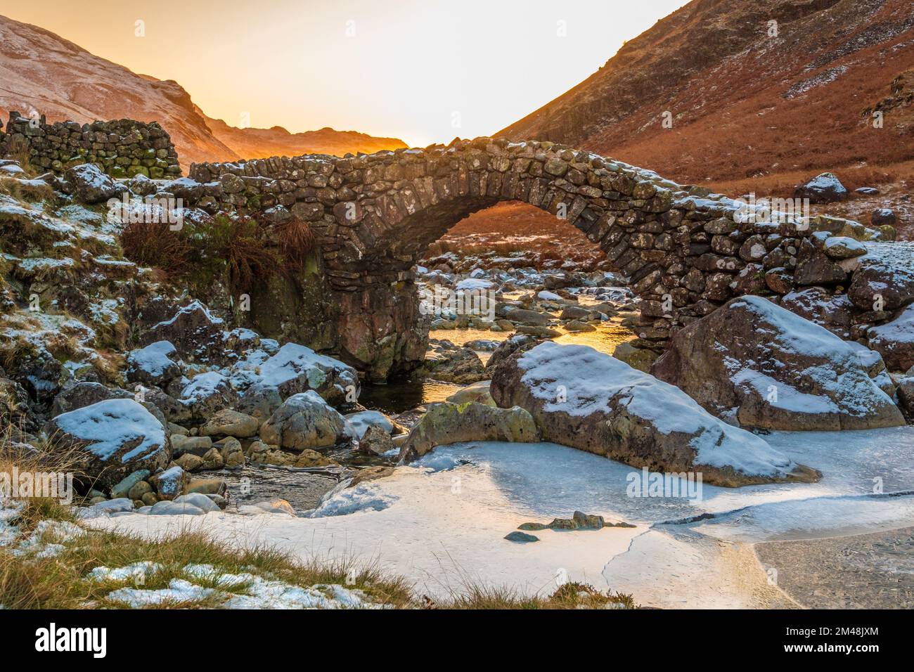 Eskdale and the packhorse bridge on the river Esk, winter, Lake District National Park, Cumbria, UK Stock Photo