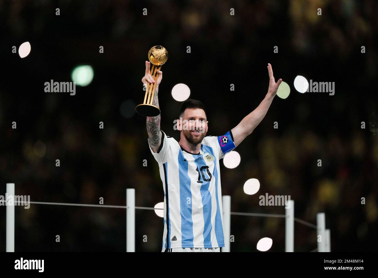 LUSAIL, QATAR - DECEMBER 18: Player of Argentina Lionel Messi receives the  World Cup 2022 Golden Ball award after the FIFA World Cup Qatar 2022 Final  match between Argentina and France at