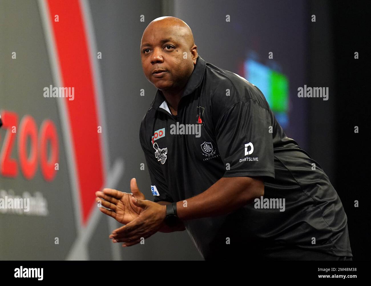 USA's Leonard Gates in action against Netherlands' Geert Nentjes during day  five of the Cazoo World Darts Championship at Alexandra Palace, London.  Picture date: Monday December 19, 2022 Stock Photo - Alamy