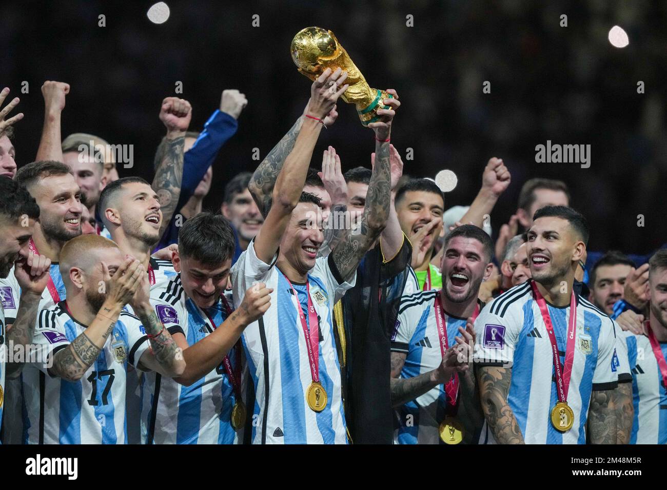 Lusail Iconic Stadium, Lusail, Qatar. 18th Dec, 2022. FIFA World Cup  Football Final Argentina versus France; Alexis Mac Allister of Argentina  lifts the world cup trophy Credit: Action Plus Sports/Alamy Live News