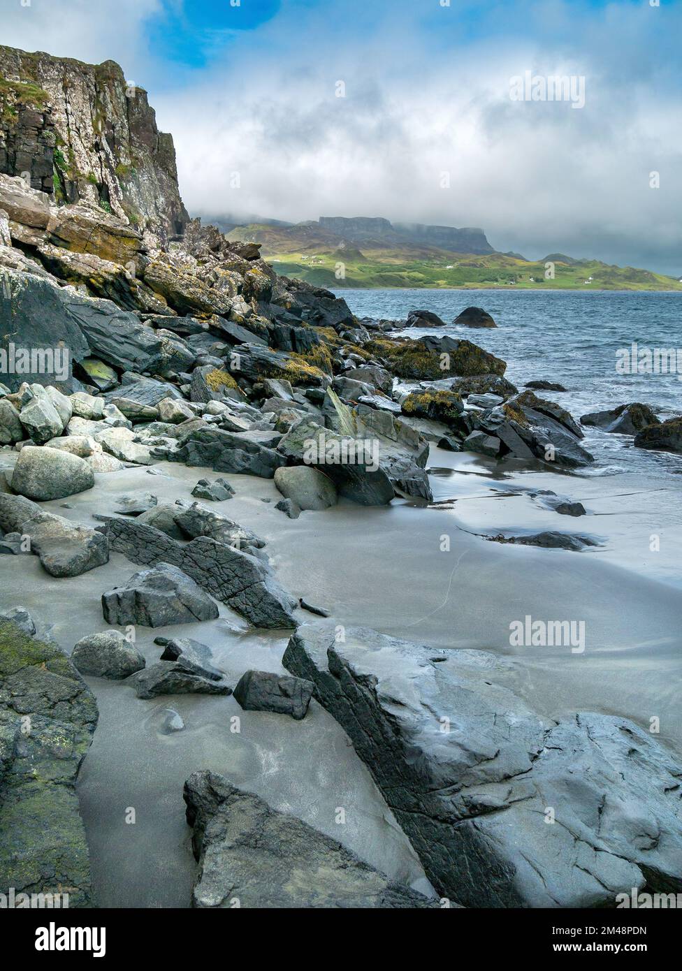 Staffin Beach and Bay with Flodigarry in the distance, Isle of Skye, Scotland, UK Stock Photo