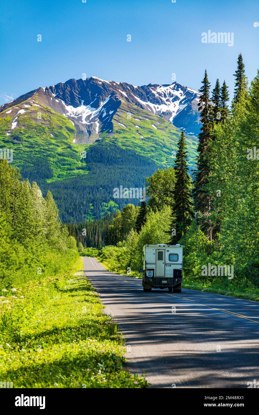 Camper driving the Stewart Cassiar Highway near Red Flats Rest