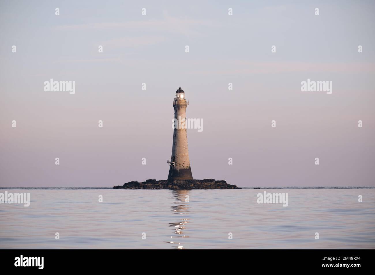 Dusk over Chicken Rock lighthouse off the Calf of Man, Isle of Man