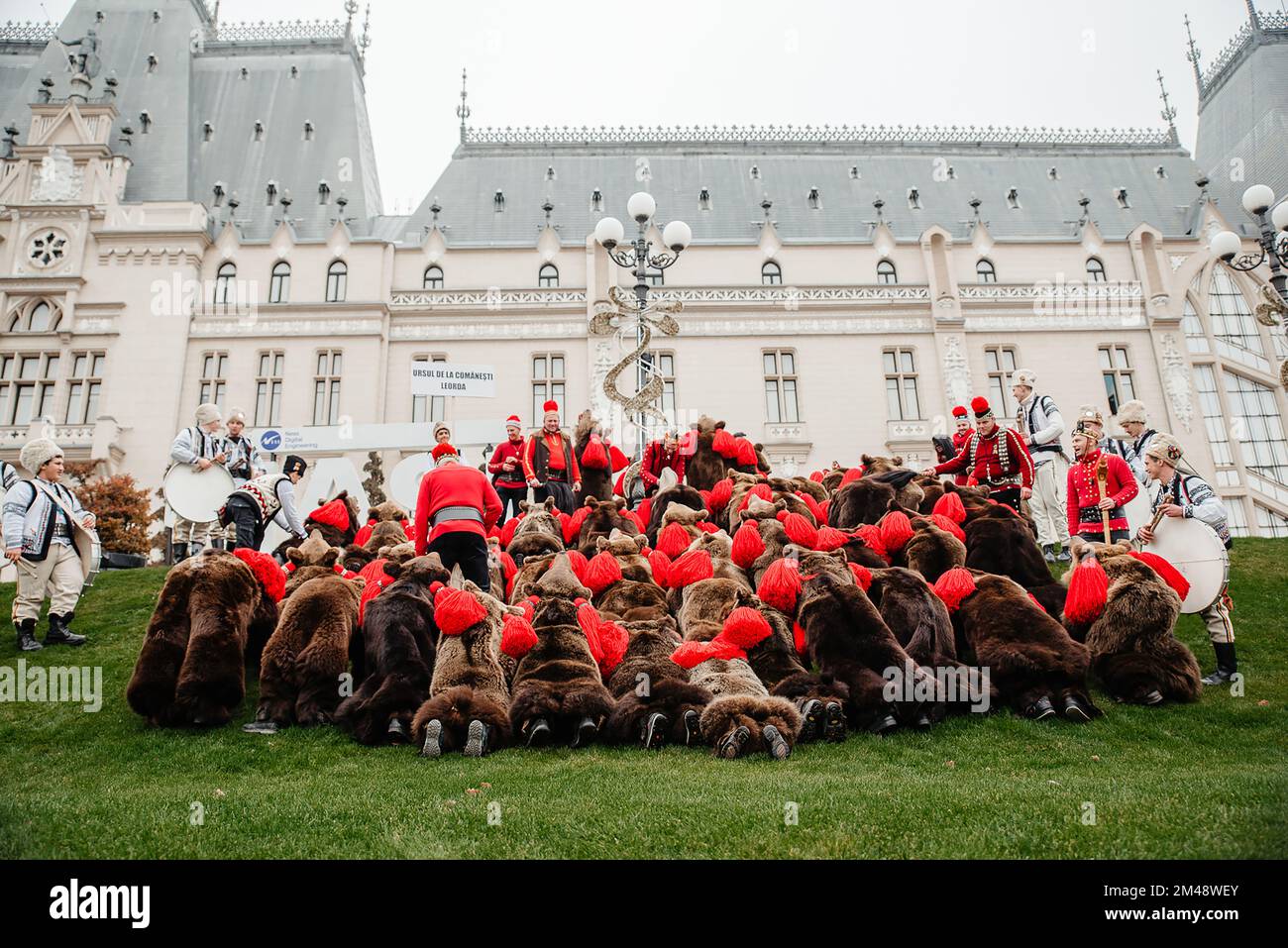 A Group Of People Wearing Bear Costumes For The Traditional Romanian