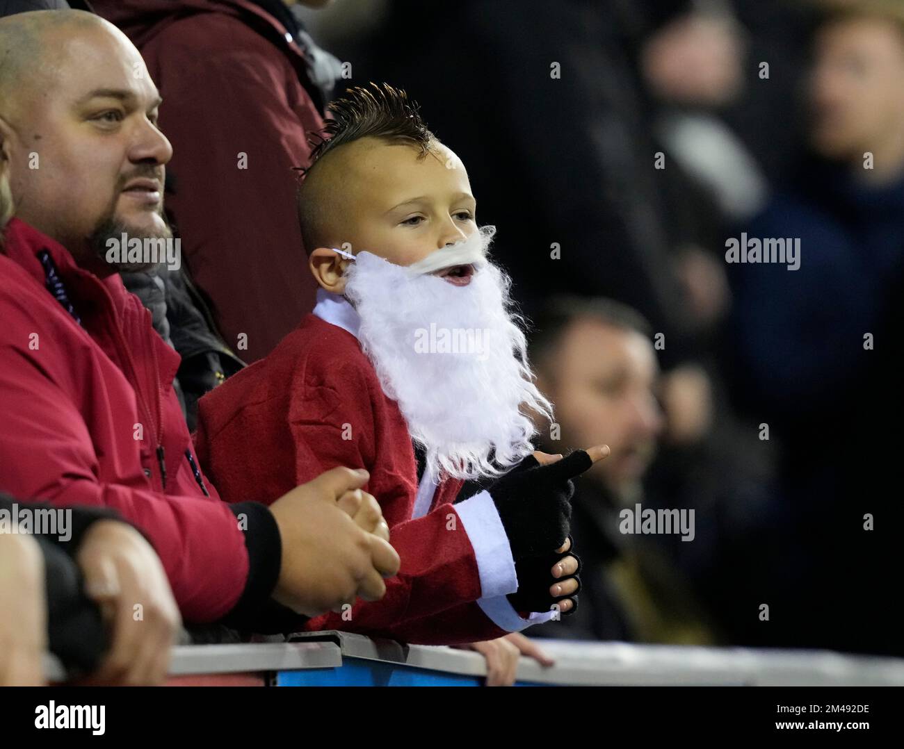 Wigan, England, 19th December 2022.  Sheffield Utd fans dressed as Father Christmas during the Sky Bet Championship match at the DW Stadium, Wigan. Picture credit should read: Andrew Yates / Sportimage Stock Photo