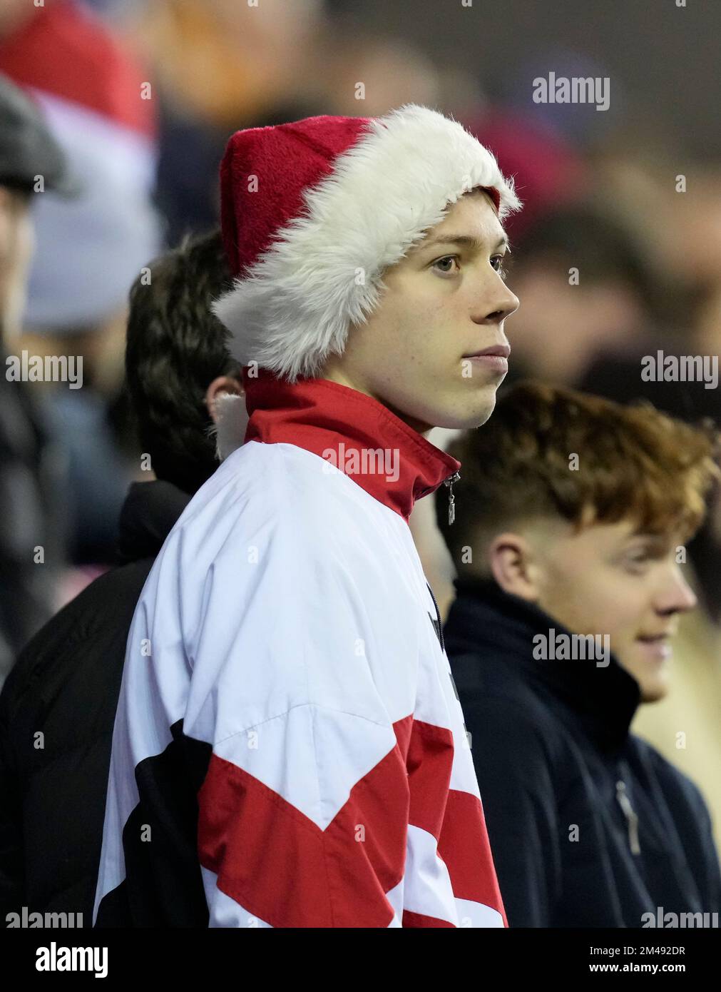 Wigan, England, 19th December 2022.  Sheffield Utd fans with Christmas hats during the Sky Bet Championship match at the DW Stadium, Wigan. Picture credit should read: Andrew Yates / Sportimage Stock Photo