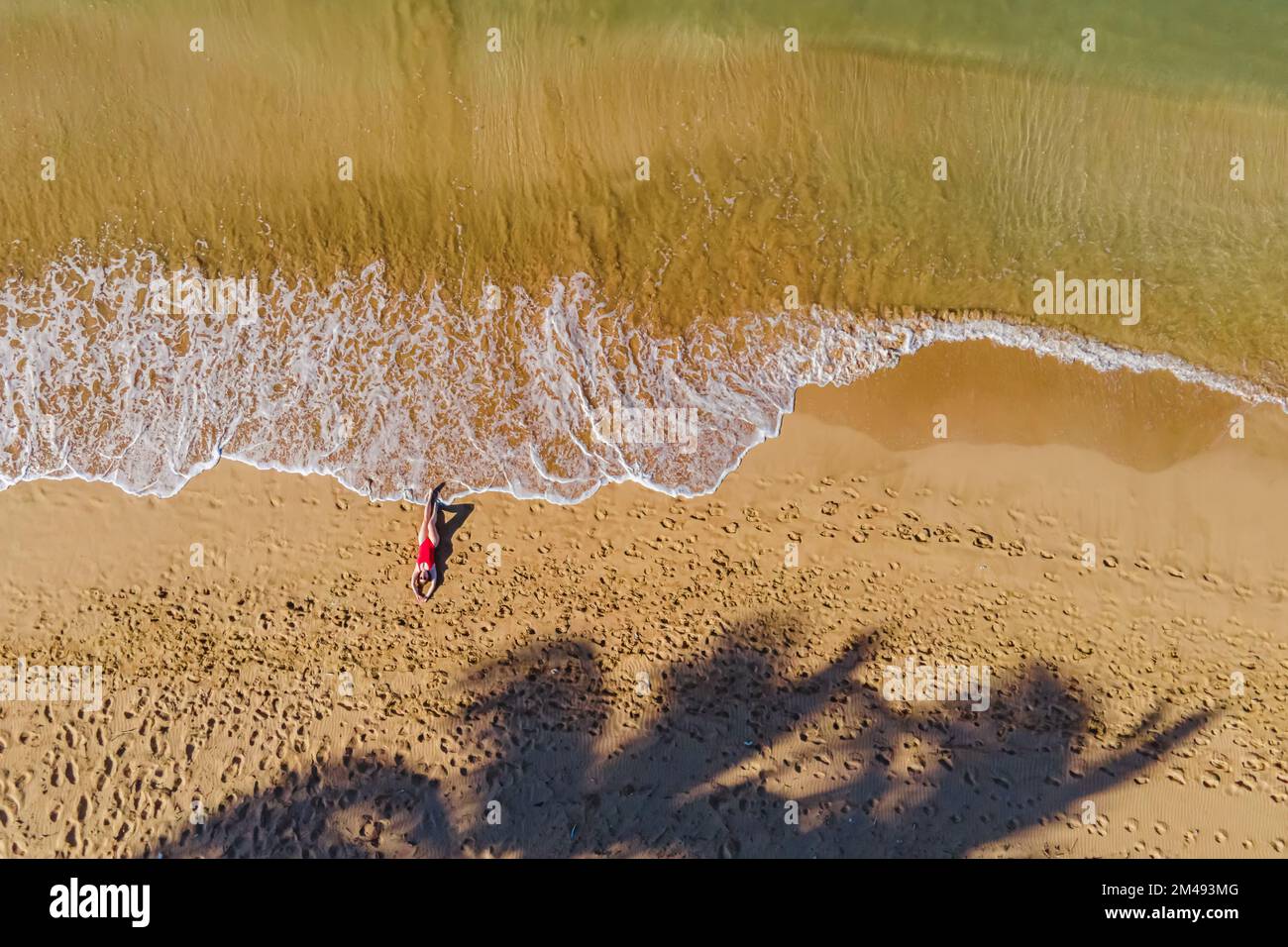 Beautiful waves on sandy beach hi-res stock photography and images - Alamy