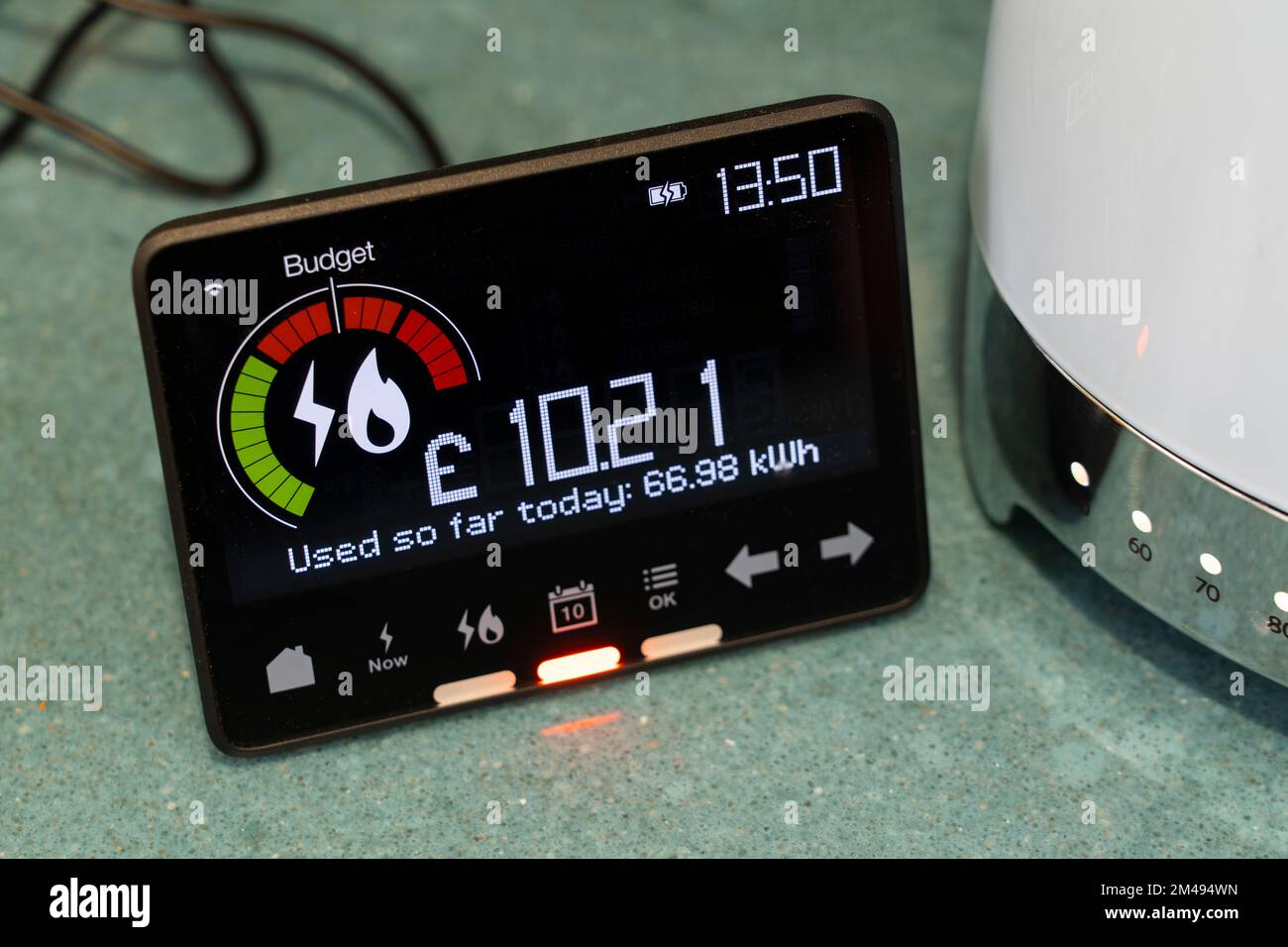 Smart energy meter showing energy usage in kilowatt hours (kWh). Theme: cost of living, rising energy bills, living standards, energy usage Stock Photo