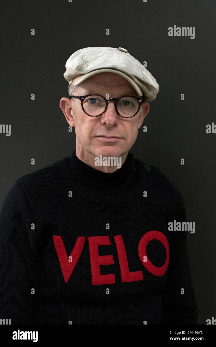 Portrait of a stylish man wearing a jumper with velo logo Stock Photo