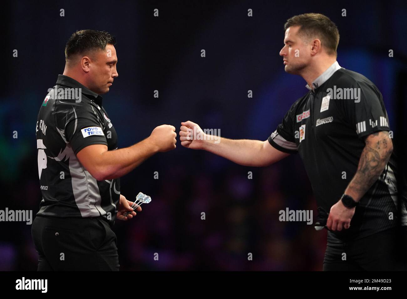 Wales' Gerwyn Price shakes hands with England's Luke Woodhouse during day five of the Cazoo